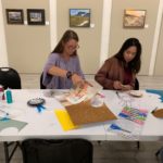 Students help prepare activities for families_Hurricane Michael Survivors in Port St Joe at “the Joe” their community art center